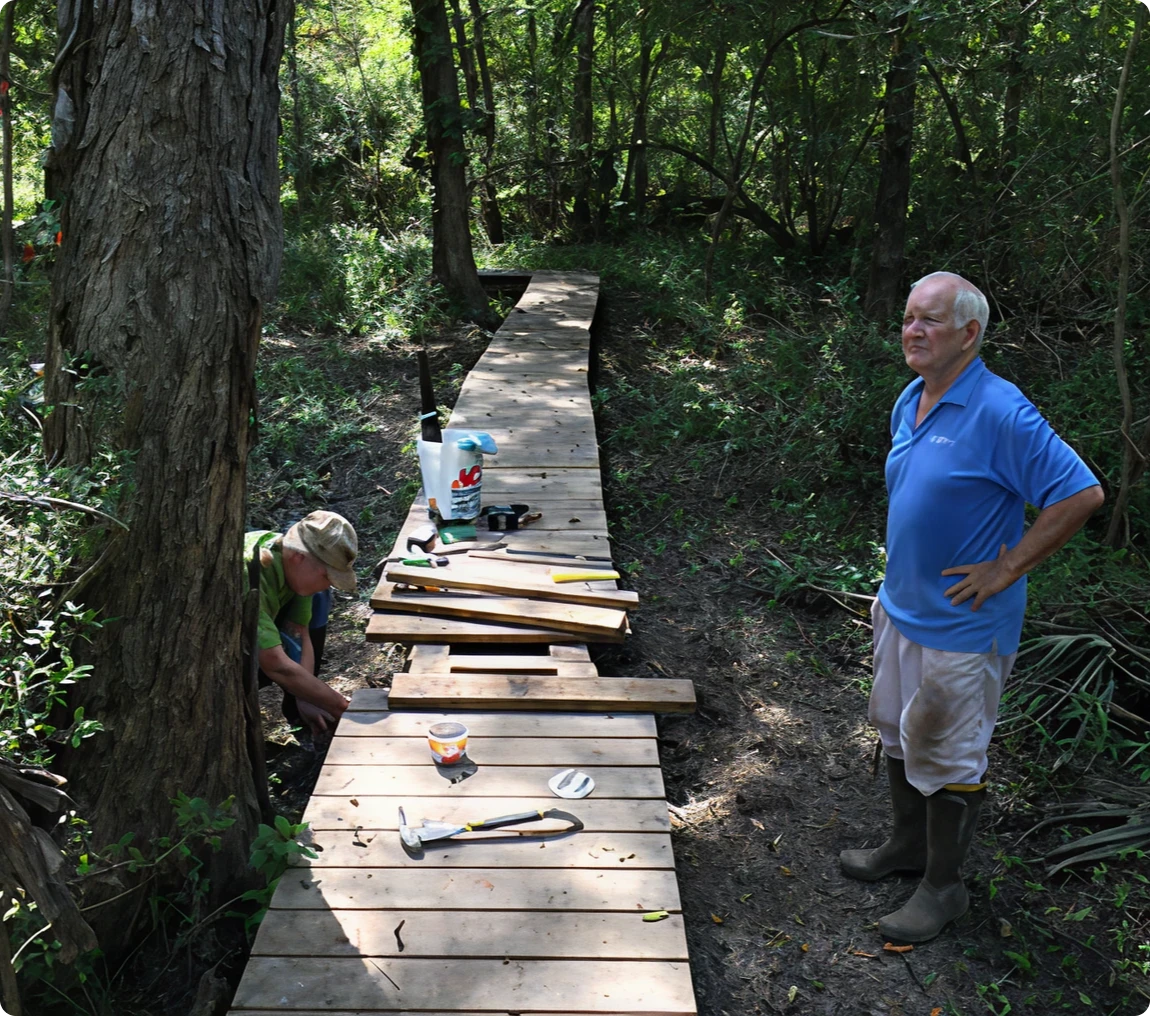 Outdoor repair work on forest path