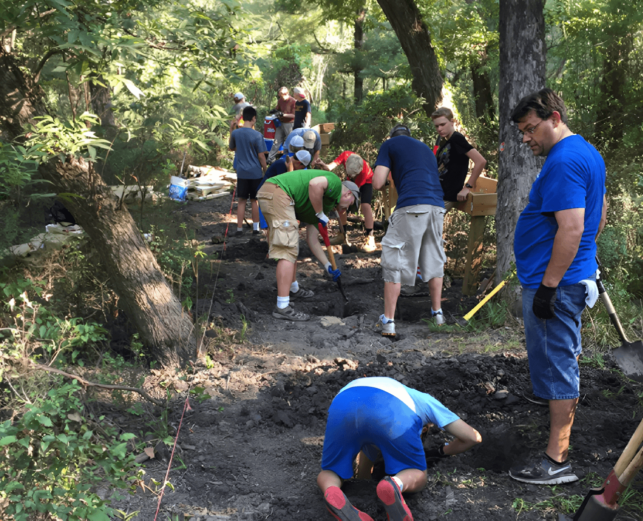 Group volunteering in a forest cleanup